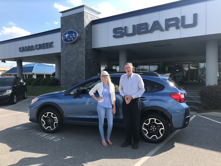 Mr Neuhs with Sales Advisor Ava in front of his new 2017 Crosstrek.jpg