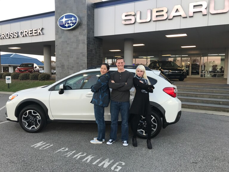 Randy & Amy with Sales Advisor Ava in front of their 2017 Crosstrek.JPG