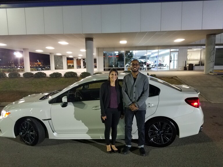 Jonathan with his new 2017 WRX and Sales Advisor Leidy Rhines.jpg