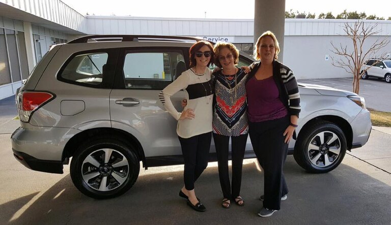 F&I Manager, Kelly Saxton, with her mom, Tammy Saxton, and Sales Advisor, Kristen. Pictured in front of Tammy's new 2017 Forester!.jpg