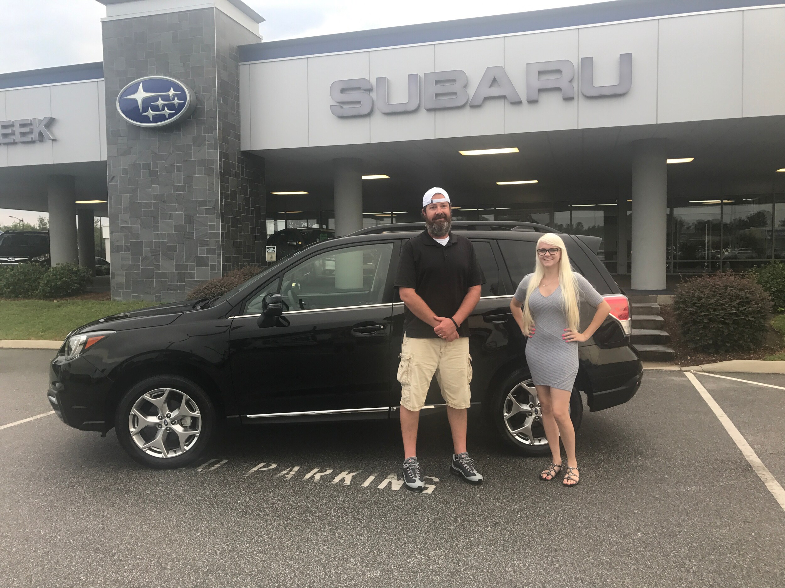 Ben with Sales Advisor Ava in front of he and his wife, Cynthia's, new 2017 Forester.jpg