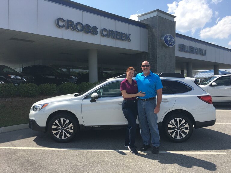 Mr. & Mrs. Kasper with their first Subaru - a 2017 Outback.JPG