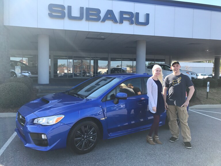 Thomas & Sales Advisor Ava with his new 2017 WRX.JPG