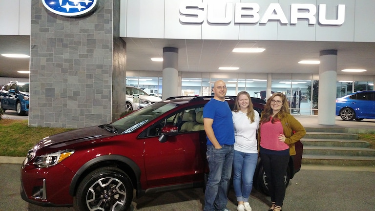 Dave & Kali with Sr Sales Advisor Emily and their new 2016 Crosstrek.jpg