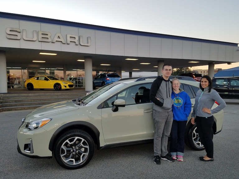 Jordan & Jennifer with Sales Advisor Leidy and their new 2017 Crosstrek.jpg