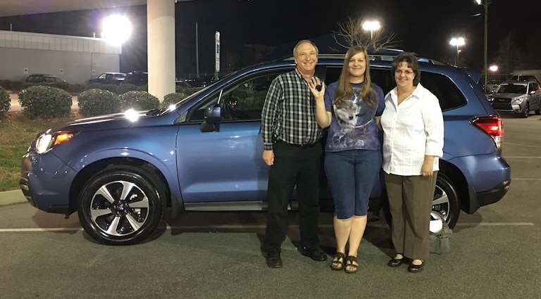 Jennifer Pittman with her Mom & Dad and her birthday present - a 2017 Subaru Forester!.JPG