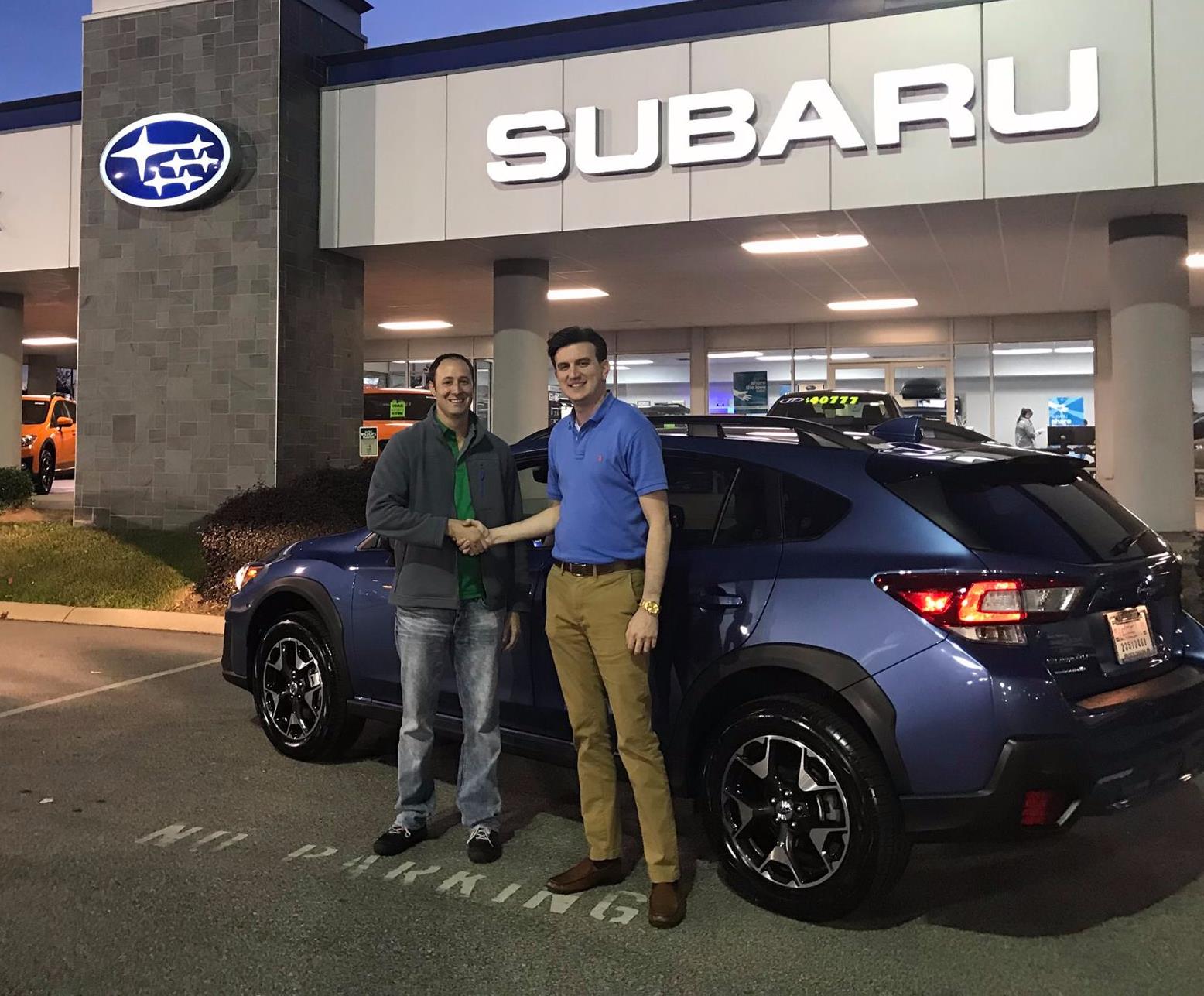 Jeremy with his new 2018 Crosstrek and Salesman Mark.jpg