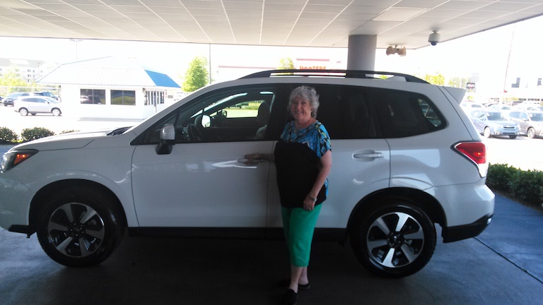 Mrs Scroggins in front of her first Subaru - a 2017 Forester!.jpg