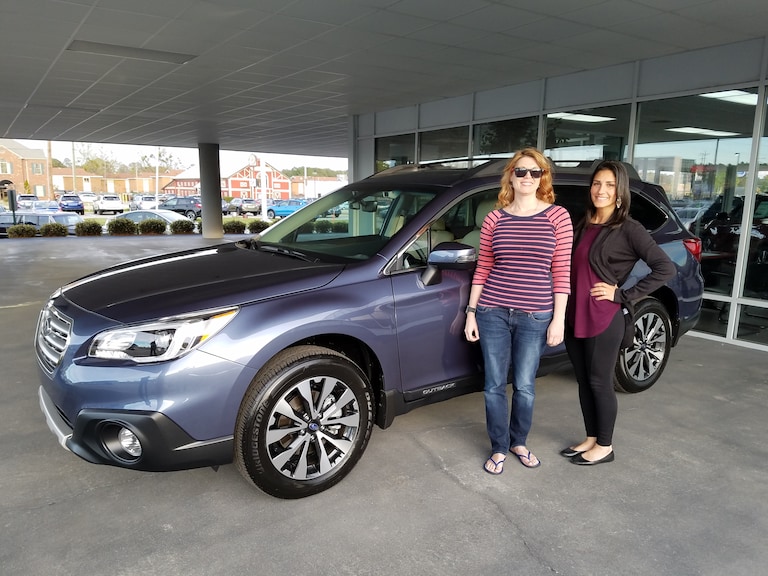 Mary in front of her 2017 Outback with Sales Advisor Leidy Rhines.jpg