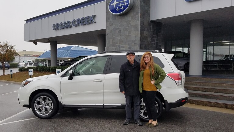 Gerald Hecker with Senior Sales Advisor, Emily Bracey and his custom ordered 2017 Forester!.jpg