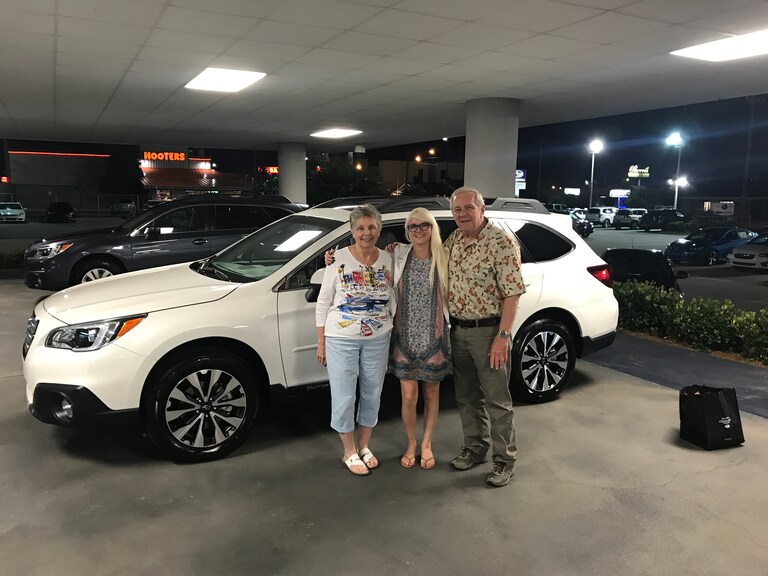 Betty & Earl with their 2017 Outback.jpg