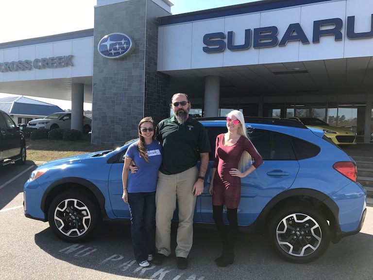 Ariel, Dennis and Sales Advisor Ava - 2017 Crosstrek Limited.JPG