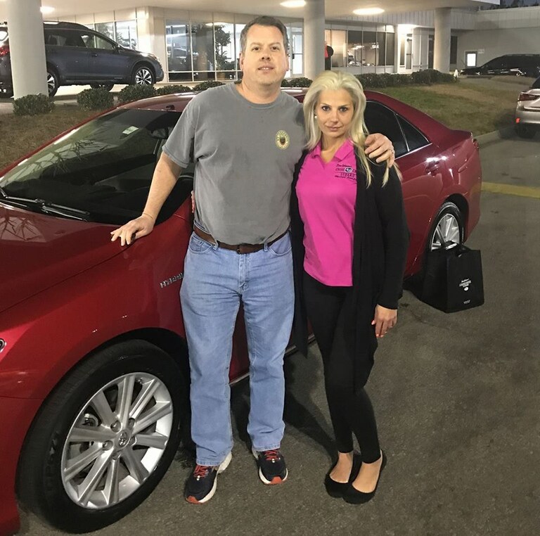 Michael Pierce with Sales Advisor Katey and his 2013 Camry Hybrid.jpg