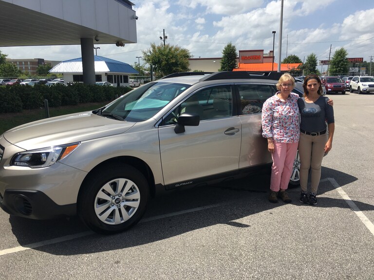 Mrs McCutchen with Sales Advisor Katey in front of her new 2017 Subaru Outback!.JPG