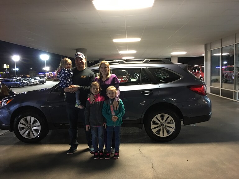 Mr & Mrs Smith with their family and new 2017 Outback.JPG
