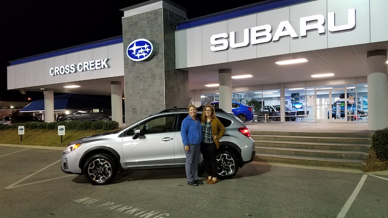 Yvonne Rouse and Senior Sales Advisor Emily Bracey. Yvonne just purchased her second Subaru - a Crosstrek! #SubaruForLife.jpg