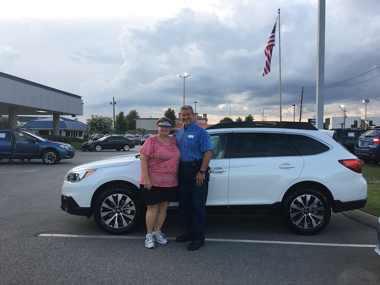 Mr & Mrs Black in front of their 2017 Outback.jpg