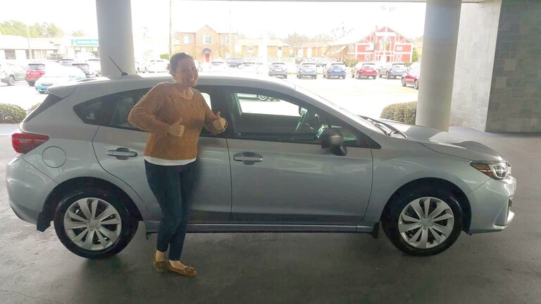 Maren excited to have her brand new 2017 Impreza!.jpg