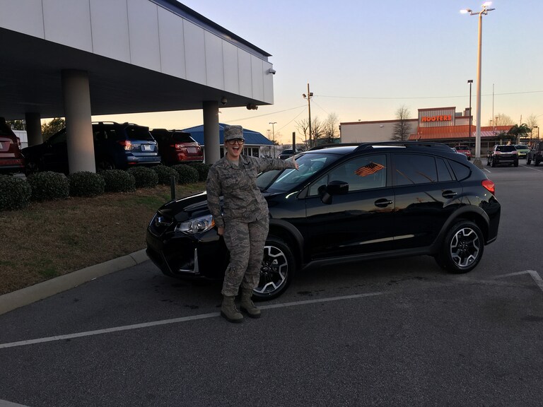 Valerie Essman with her first Subaru - a 2017 Crosstrek.JPG
