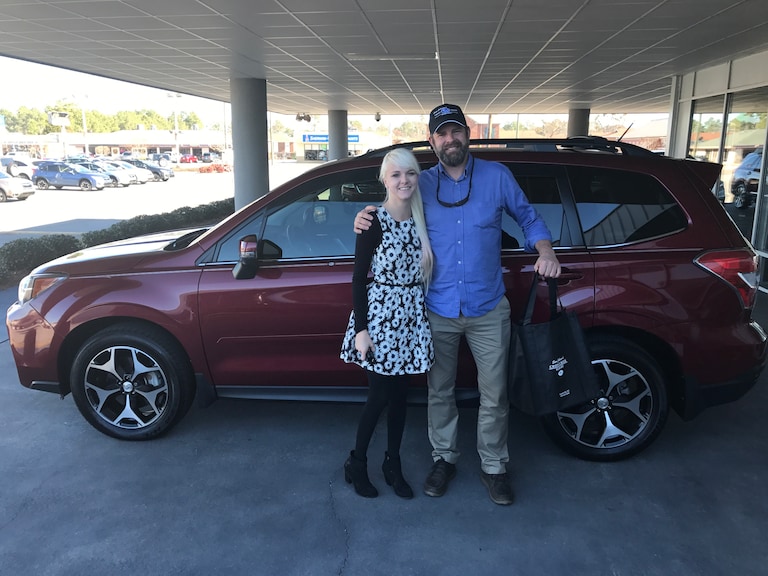 Mr Lindgren with Sales Associate Ava in front of his 2014 Forester 2.0XT Touring.JPG