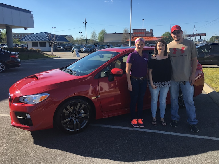Mr & Mrs Shirley with Sales Advisor Katey in front of their #FirstSubaru - a 2017 WRX.JPG