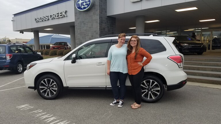Loyal Customer of Cross Creek Subaru - Mollie Dickerson in front of her new 2017 Forester XT Touring - with Sales Advisor Emily Bracey.jpg