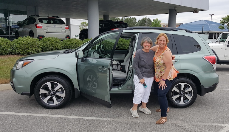 Patricia (L) and Sales Advisor Kristen (R) in front of Patricia's first Subaru - a 2017 Forester!.jpg
