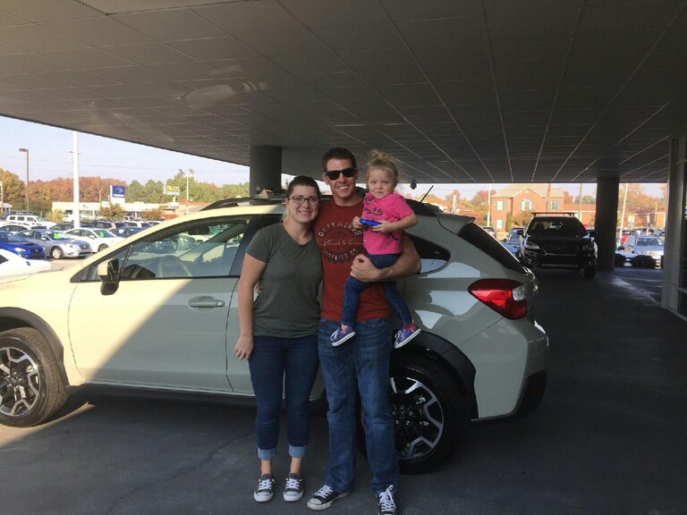 Jesse, Tiffany and daughter Abby with new Crosstrek - excited to go off roading!.jpg