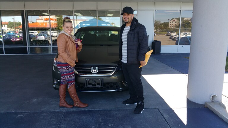 Ashley Mitchell & Victor Madera with their Honda.jpg