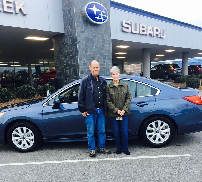 Mr & Mrs Hartley with their new 2017 Legacy - the second car from Cross Creek Subaru.JPG