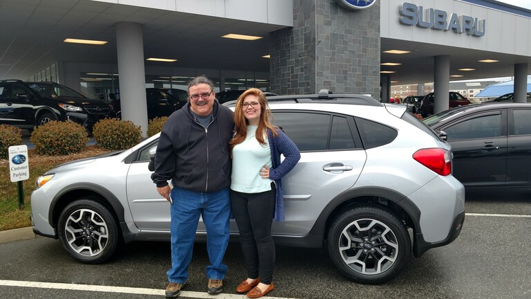 Tony Galarza with Sr Sales Advisor Emily Bracey in front of his 2nd Subaru - a 2017 Crosstrek!.jpg