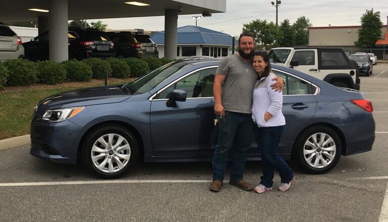 Newlyweds, Mr & Mrs Auman, in front of their 2nd Subie- a 2017 Legacy.JPG