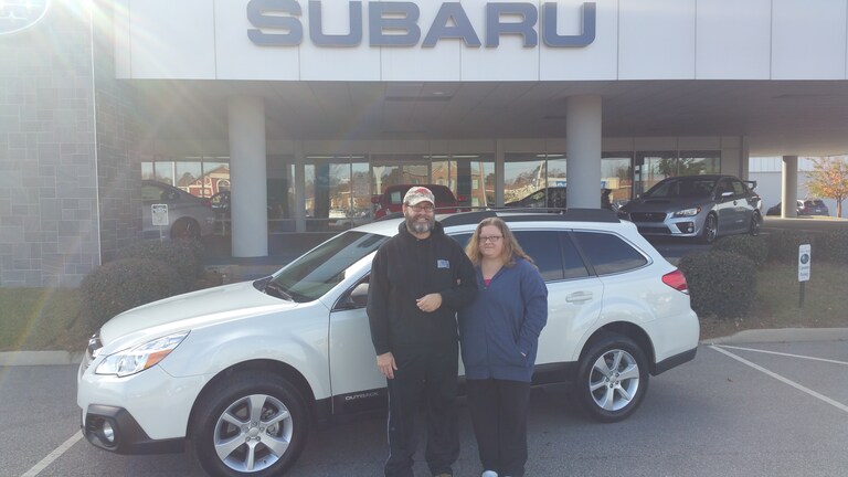 Mr & Mrs Hogue with their newly purchased 2014 Outback.jpg