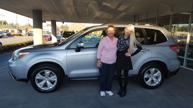 Linda with Sales Advisor Ava in front of her 2016 CPO Forester.jpg