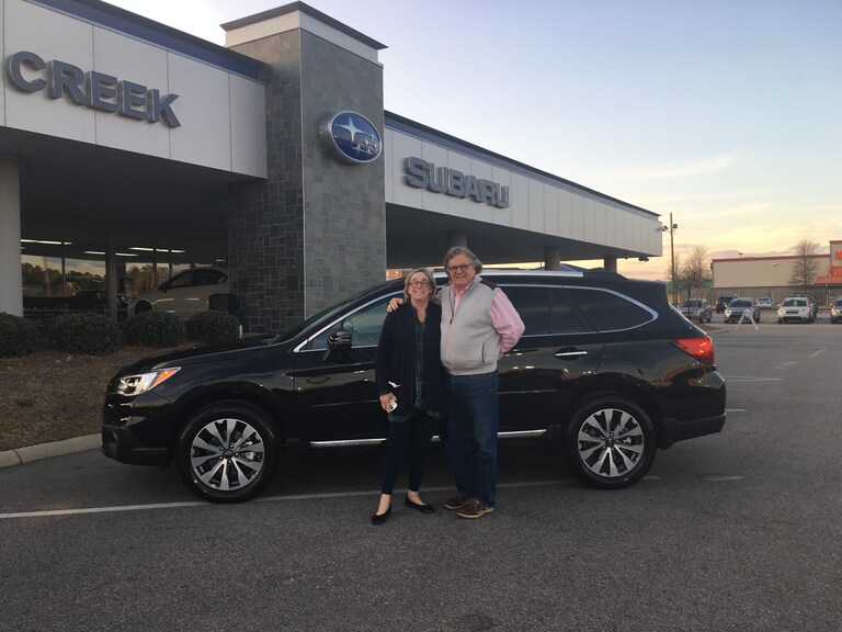 Mr & Mrs Bradbury with their first Subaru - 2017 Outback.JPG