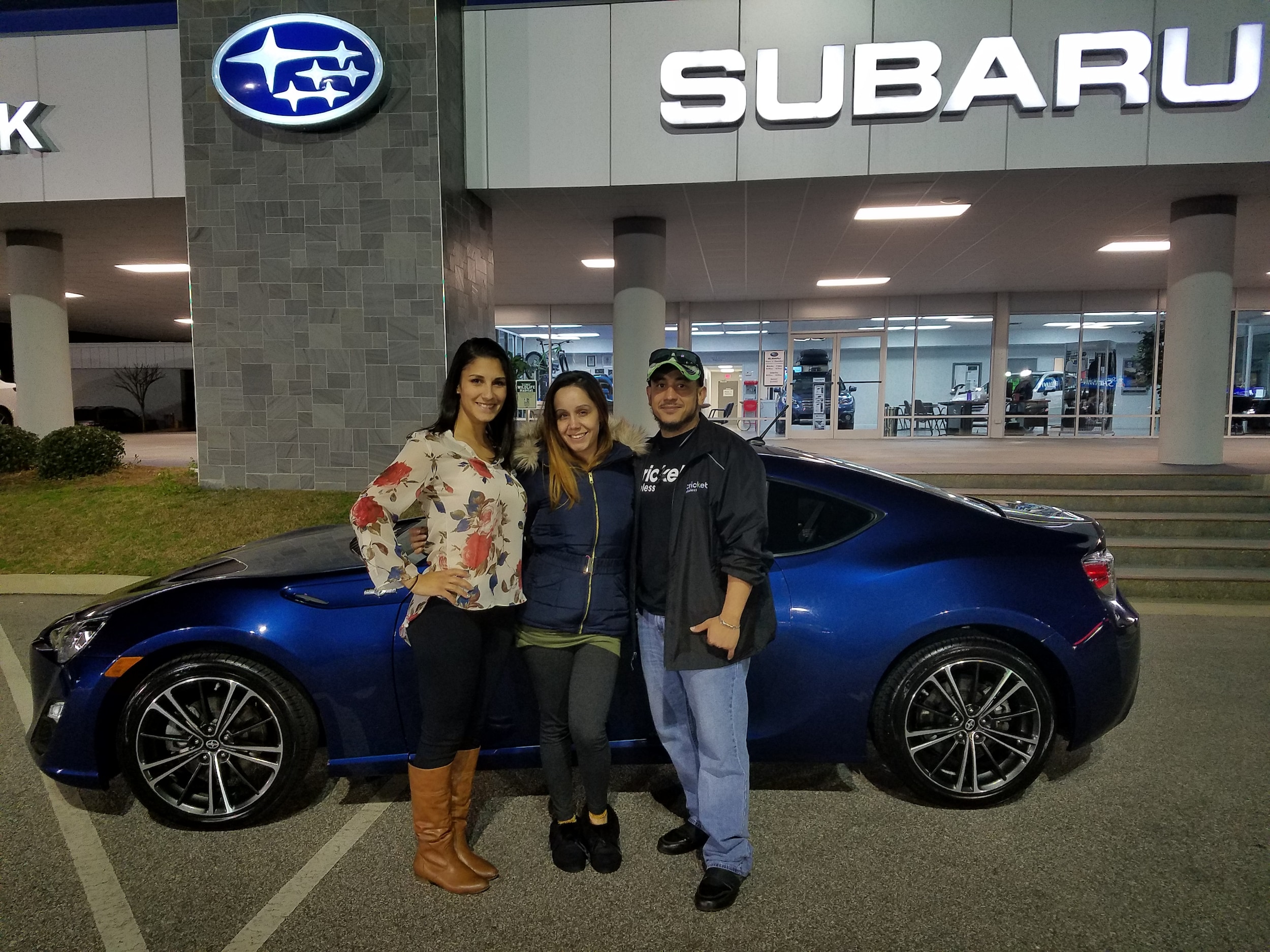 Miguel and Janelly with Sales Advisor Leidy in front of the Sanchez's new 2013 FR-S.jpg