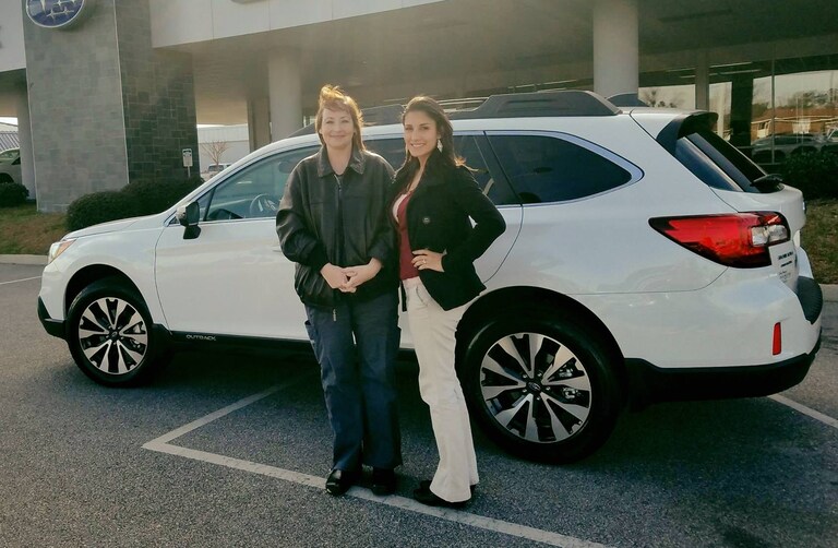 Audrey with Sales Advisor Leidy in front of her dream car - the 2017 Outback.jpg