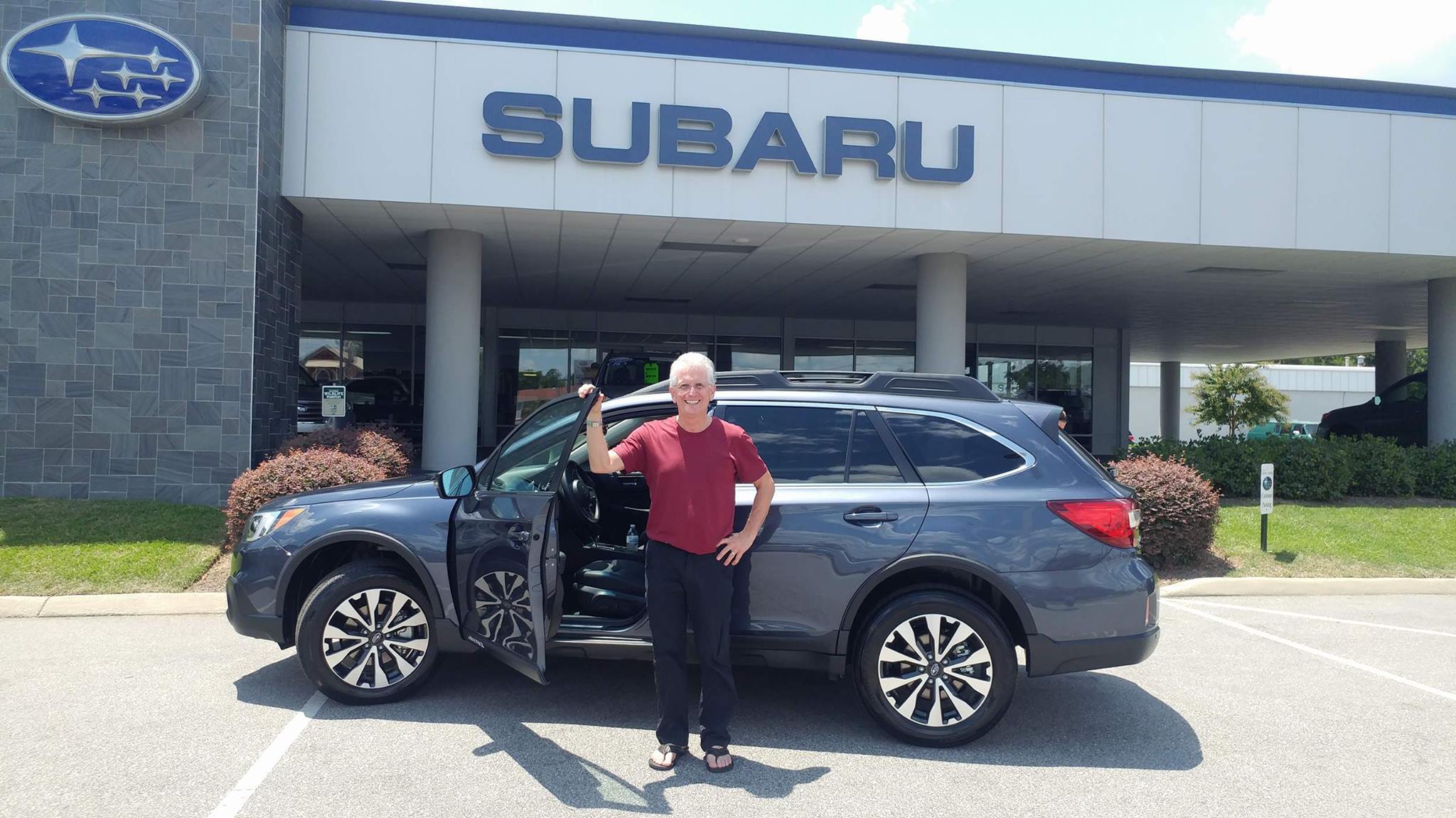 John in front of his 3rd Subaru, a 2017 Outback!.jpg