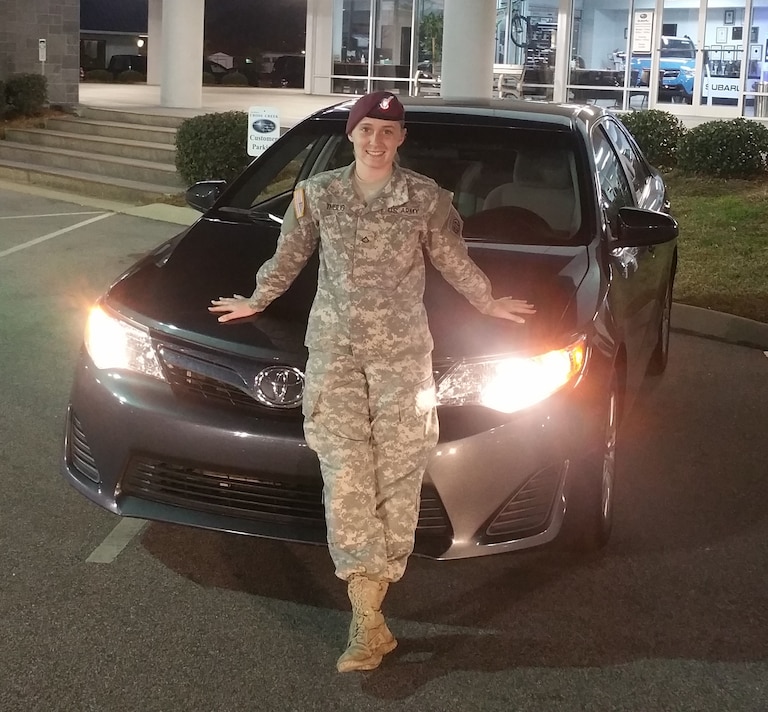 Briana with her first auto purchase on her own - a 2012 Camry #crosscreekpreowneds.jpg