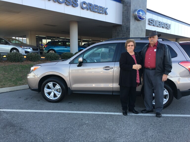 James & Flora with the 2016 CPO Forester they just purchased.JPG