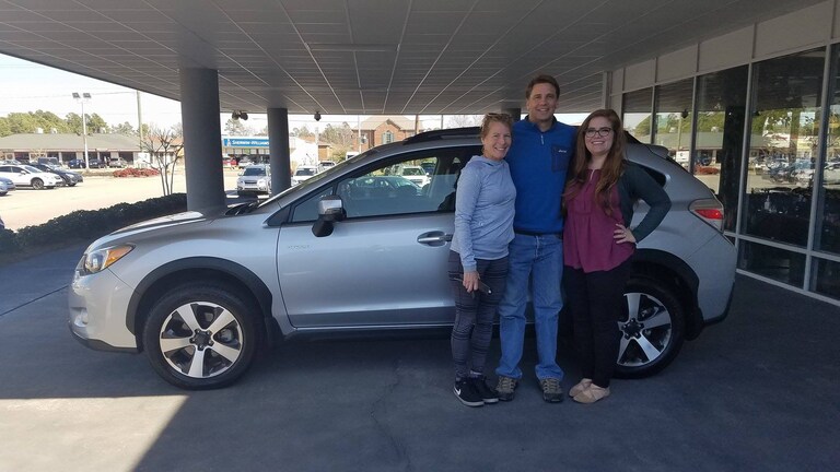 The Kopplins with Sr Sales Advisor Emily Bracey and their 2014 Crosstrek Hybrid.jpg