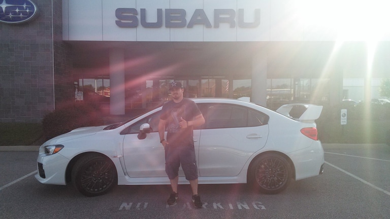Mr Owens in front of his new 2017 WRX STI.jpg