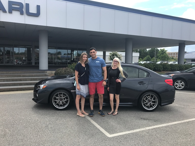 Mr & Mrs Ruiz with Sales Advisor Ava in front of their 2nd Subie - a 2017 WRX STI.jpg