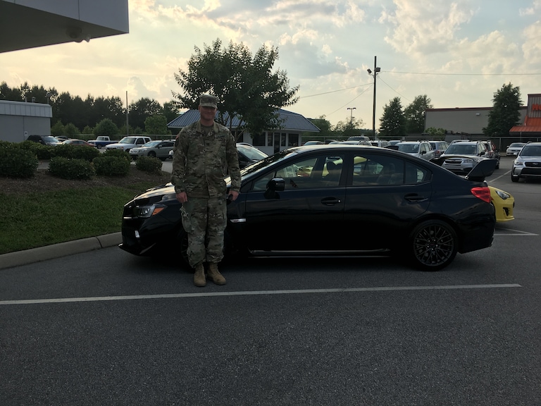 Carl in front of his first Subaru - a 2017 WRX STI!.JPG