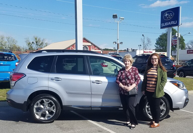 Lucinda with Sales Advisor Emily Bracey in front of her new 2017 Subaru Forester.jpg