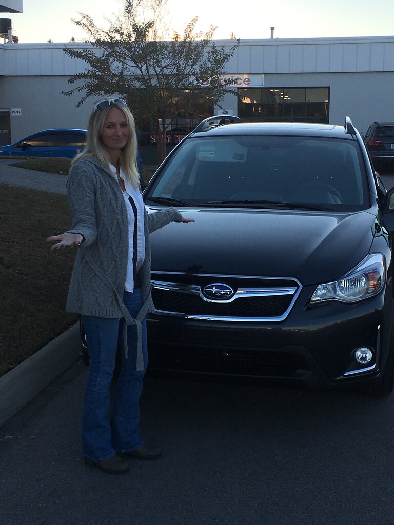 Penny Tippie showing off her new Crosstrek.JPG