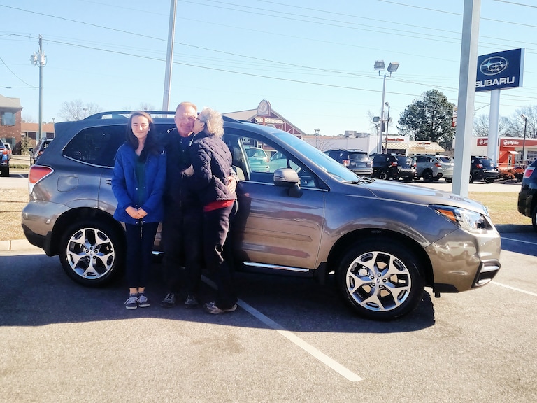 Maureen & Allen Box with their granddaughter Joey and Maureen's surprise - a 2017 Forester 2.5i Touring.jpg