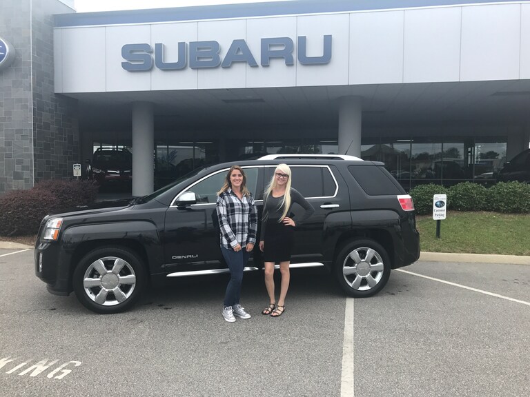 Whitney with Sales Advisor Ava in front of her 2013 GMC Terrain from the #CrossCreekPreowneds.JPG