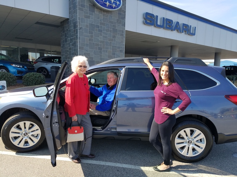 Mr & Mrs Lewis with Sales Advisor Lewis & their 65th Valentines Day gift! - a 2017 Outback.jpg