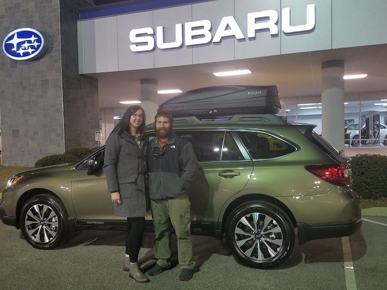 Nick & Jessica with their new 2017 Outback.jpg
